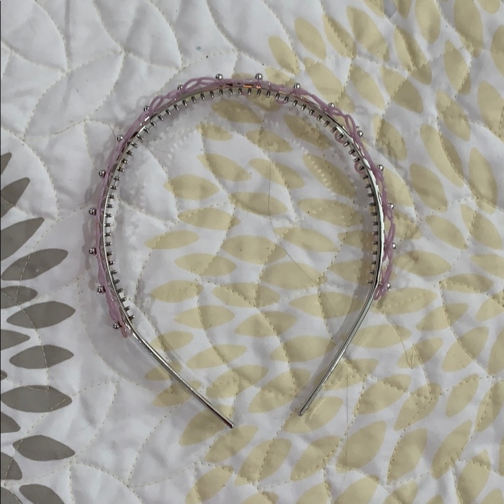 A butterfly purple head band